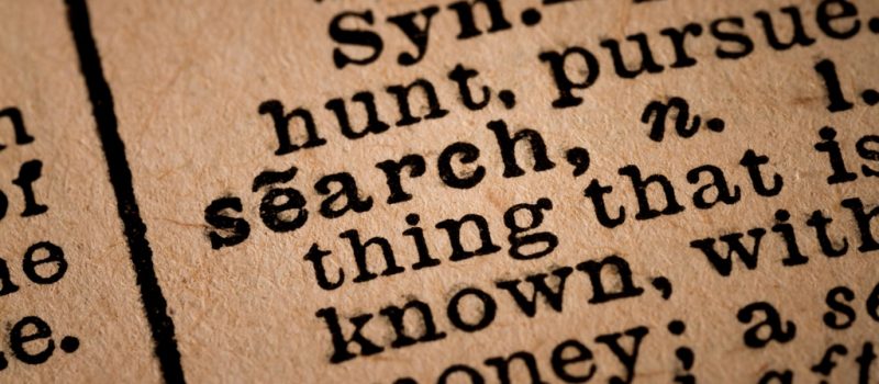 October 1st, 2015 - Montreal, Canada. Close-up of an Old 1945 Webster Vintage Dictionary showing the Word SEARCH